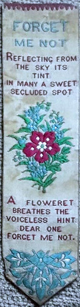 Bookmark with title words, words of short verse, image of flowers and further short verse