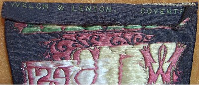 WELCH & LENTON makers name woven on the reverse top turn-over of this bookmark