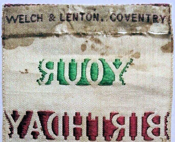 WELCH & LENTON makers name woven on the reverse top turn-over of this bookmark