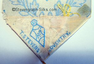 Incomplete diamond registration mark woven on the back of this bookmark