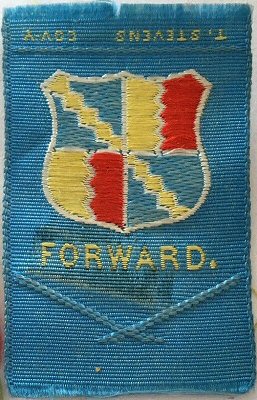 Ribbon with word: Forward, and shield