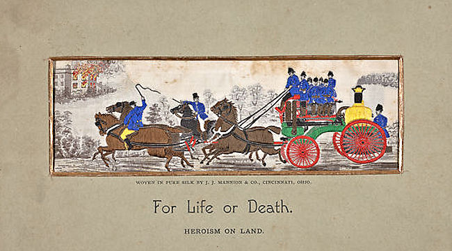 Old steam fire engine drawn by four horses, with J.J. Mannion printed credit