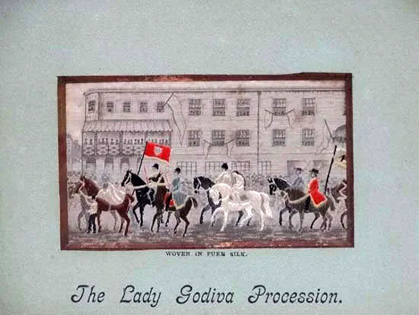 Procession through streets of Coventry, of soldiers with flags, and Lady Godiva, with Peeping Tom in corner of building - postcard version reduced silk
