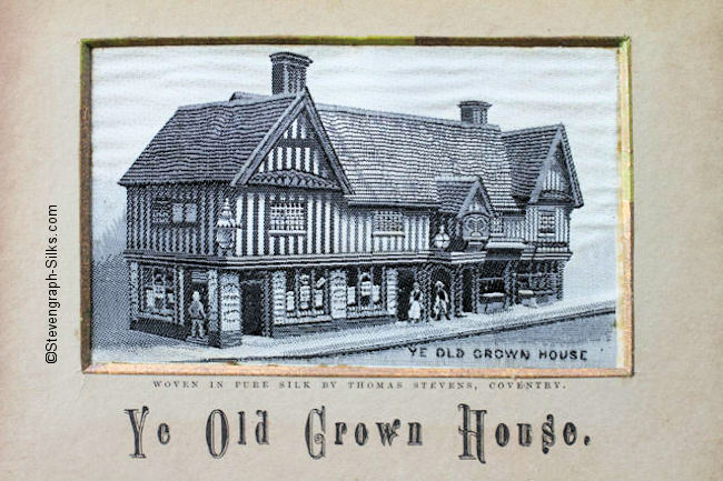 Image of old wooden framed building; pavement curb stones to front only.