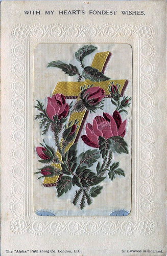 Stevens Alpha series postcard with woven image of red roses and gold coloured cross, from the Stevens bookmark, with printed title