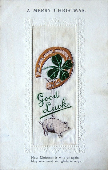 Alpha series postcard with woven GOOD LUCK words, image of four-leaf clover and a pig, with printed title