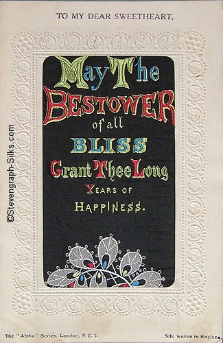 Stevens Alpha series postcard with woven MAY THE BSTOWER OF ALL BLISS words from the Stevens bookmark, with printed title