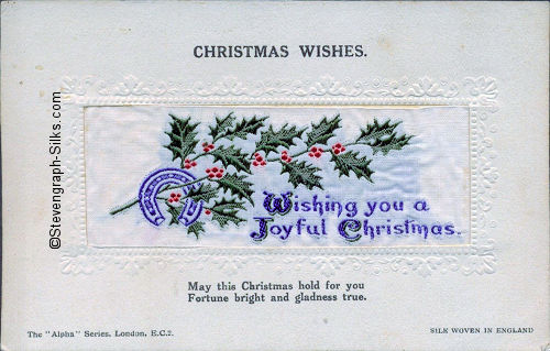 Alpha series postcard with woven WISHING YOU A JOYFUL CHRISTMAS words, printed title and words below silk