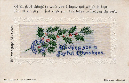 Alpha series postcard with woven WISHING YOU A JOYFUL CHRISTMAS words, printed title and words below silk