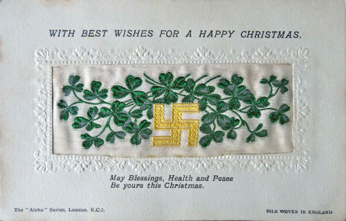 Alpha series postcard with no woven words, just cross design and shamrock, with printed title and words below silk