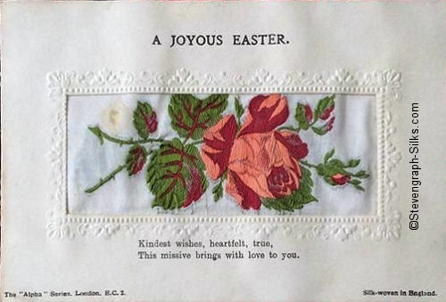 Alpha series postcard with no woven words, just image of a single rose and rose bud, with printed title and words below silk