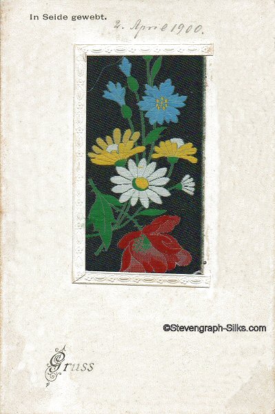 postcard with part of a Stevens woven silk bookmark, showing various flowers and buds