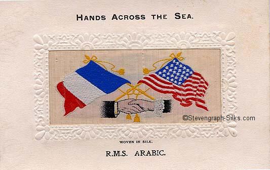 Image of French and US flags, and man's and woman's hands