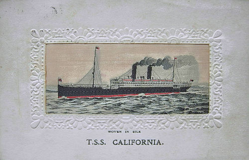 Passenger ship cruising left, with two masts and two funnels