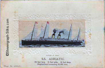 Ocean liner at anchor, with two funnels and four masts