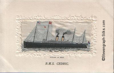 Ocean liner at anchor, with two funnels and four masts