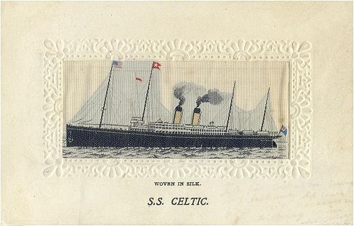 Ocean liner at anchor, with two funnels and four masts