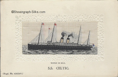 Ocean liner at anchor with two funnels and four masts