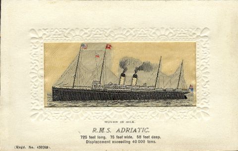 Ocean liner at anchor, with two funnels and four masts