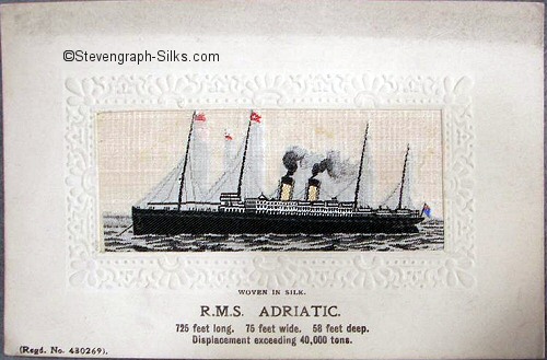 Ocean liner at anchor, with two funnels and four masts