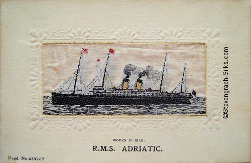 Ocean liner at anchor, with two funnels and four masts