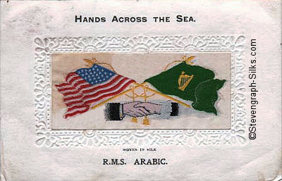 image of shaking hands, flags and tassles