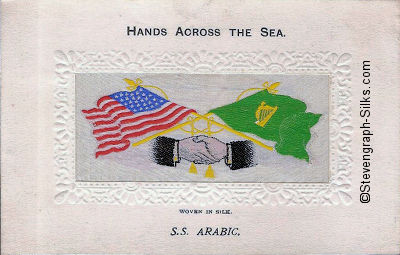 image of shaking hands, flags and tassles