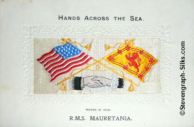 image of shaking hands, flags and tassles