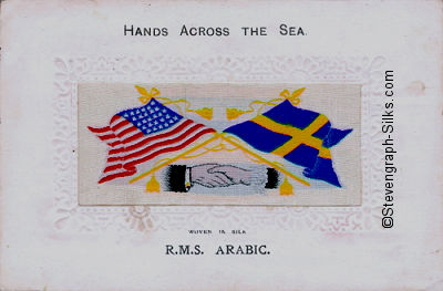 image of shaking hands, flags and tassles