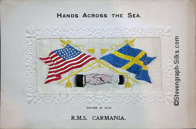 image of shaking hands, flags and tassles