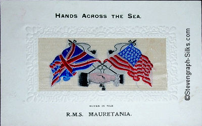 image of shaking hands, flags and tassles