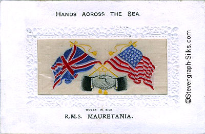 image of shaking hands, flags and tassles