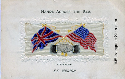 image of shaking hands, flags and tassles