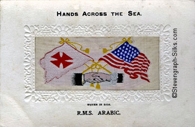 image of shaking hands, flags and tassles