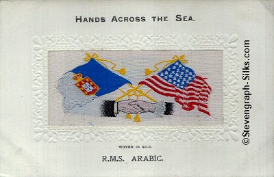 image of shaking hands, flags and tassles