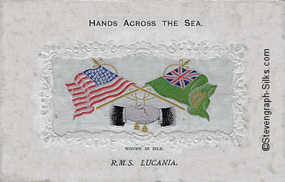 image of shaking hands, flags and tassles