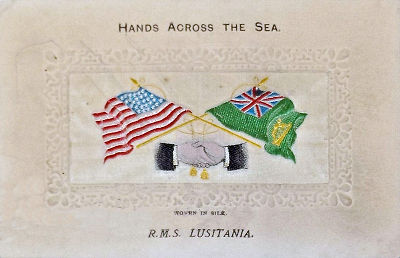 image of shaking hands, flags and tassles